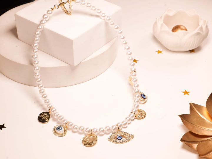 Pearl Harmony Evil Eye Charm Necklace | White Faux Pearls with Gold-Tone Celestial Charms & Crystal Eye Amulet