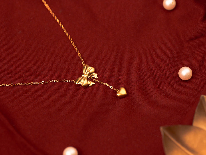 Gold-Plated Bow & Heart Pendant Necklace