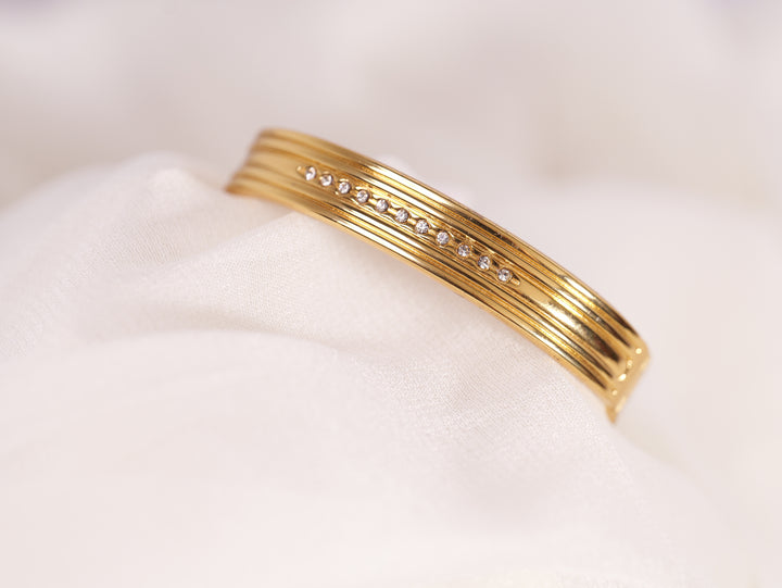 Textured Gold Bracelet with Diamond Detailing