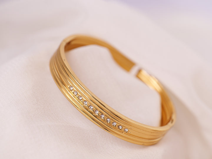 Textured Gold Bracelet with Diamond Detailing
