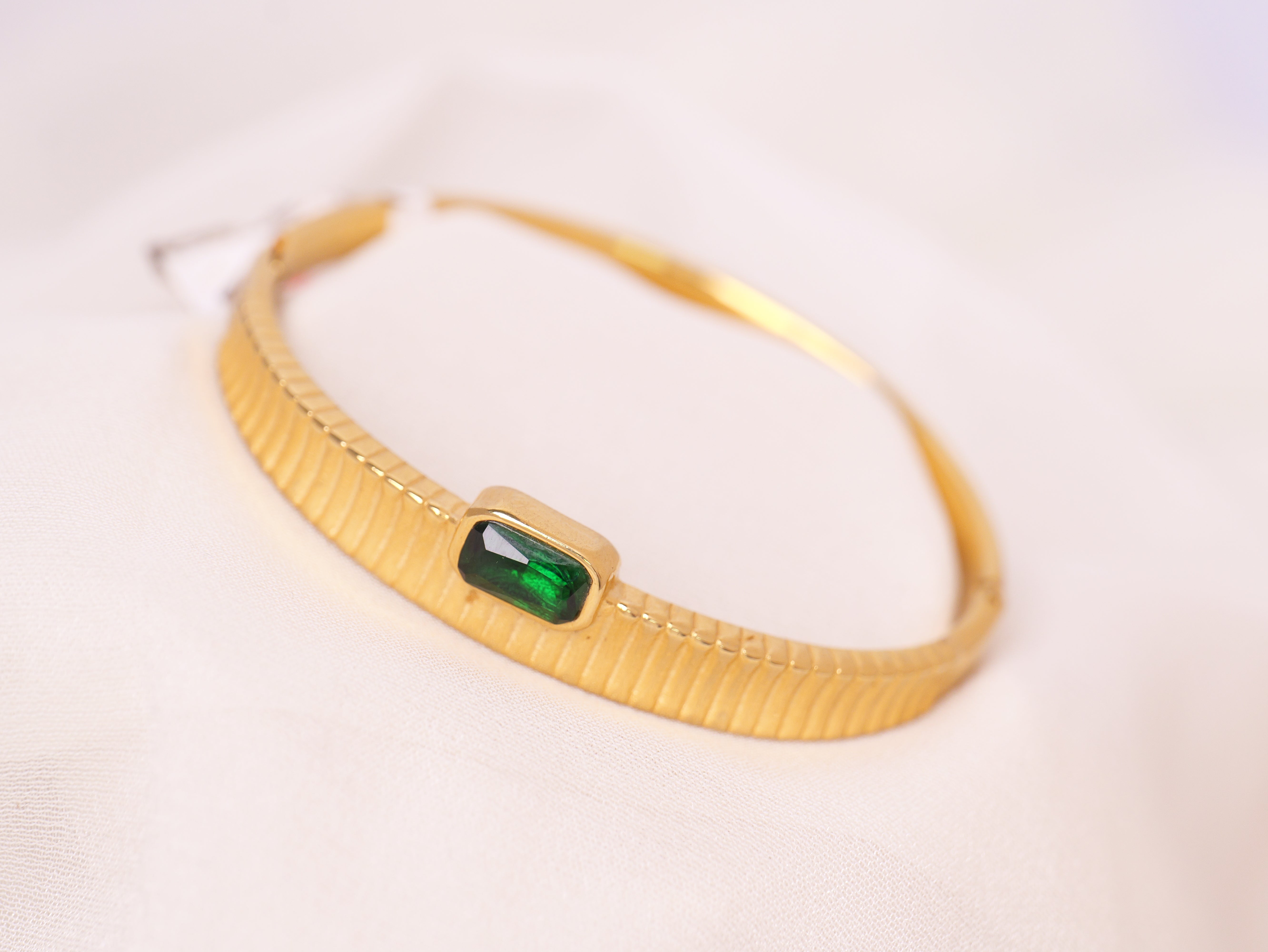 Emerald Glow Gold Bracelet