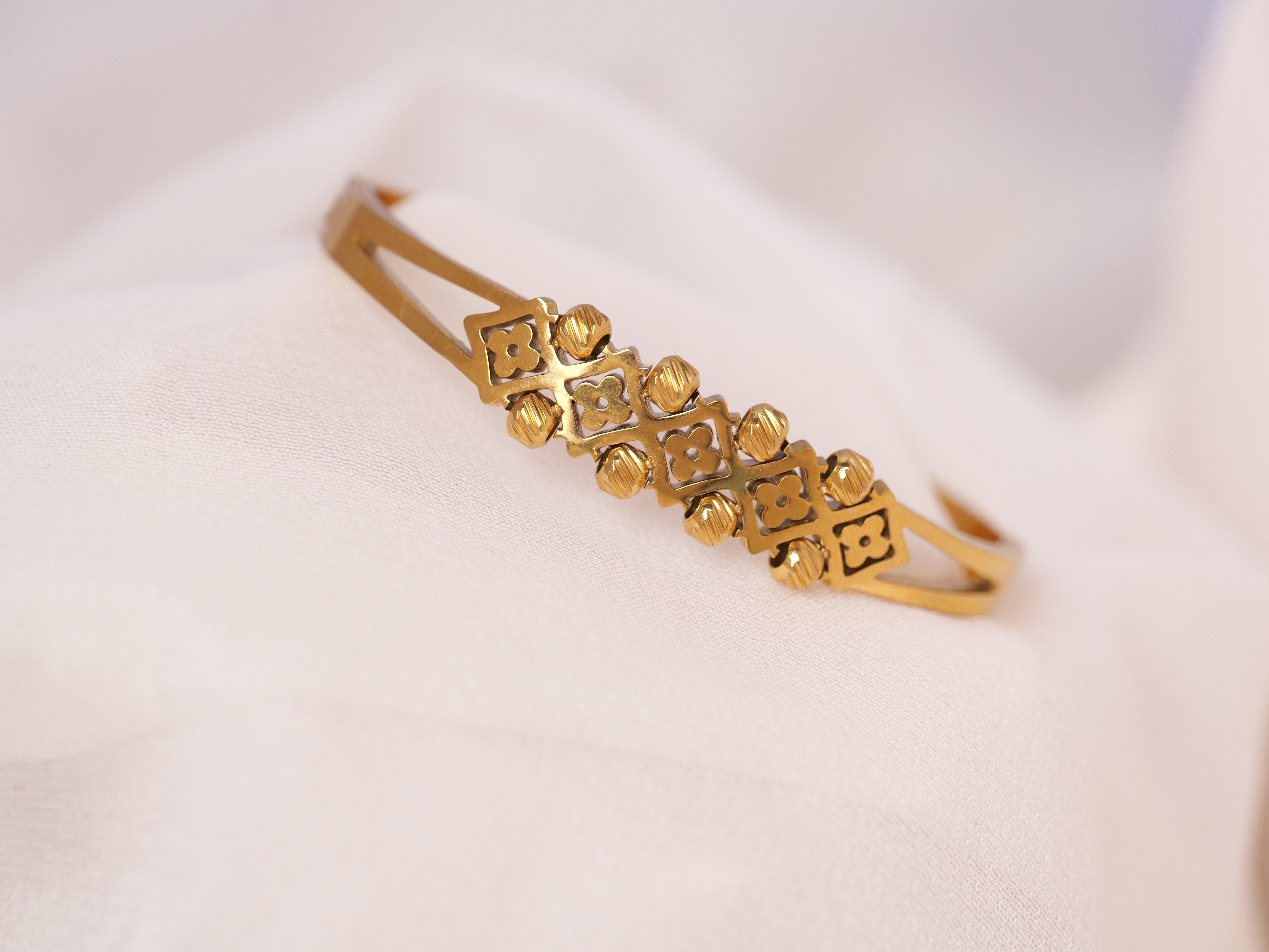 Regal Motif Gold Cuff Bracelet