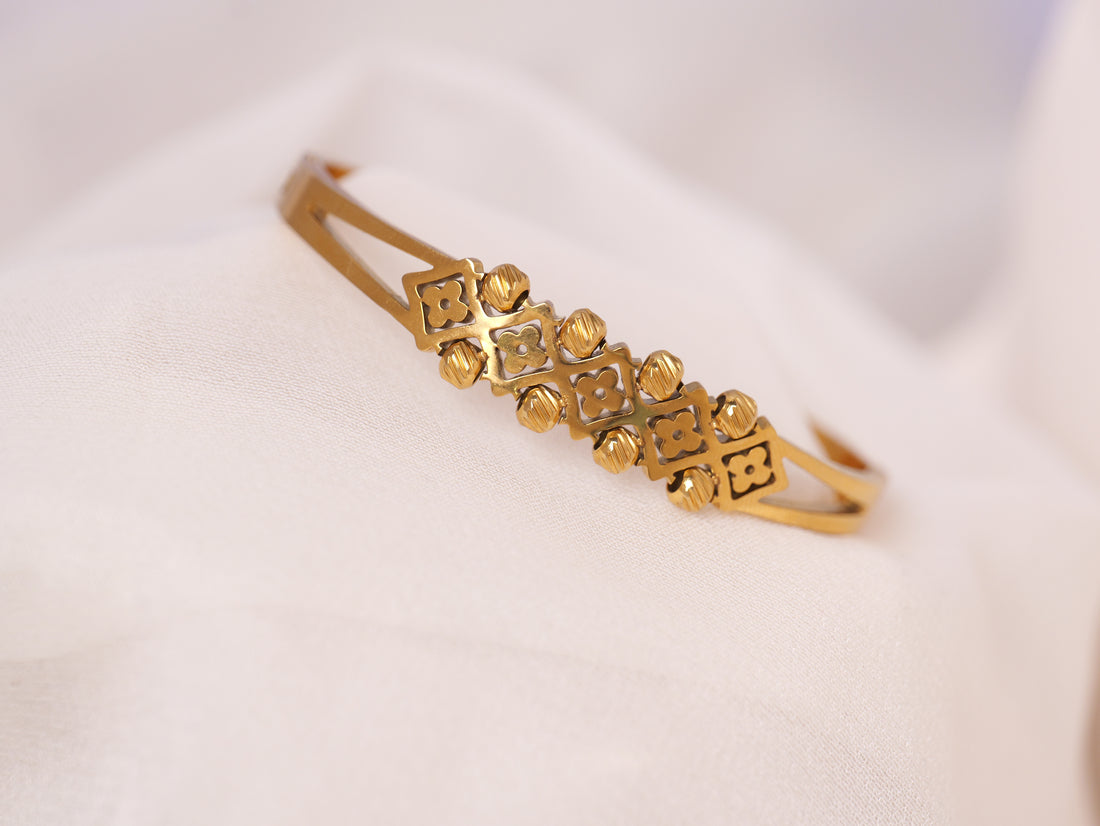 Regal Motif Gold Cuff Bracelet
