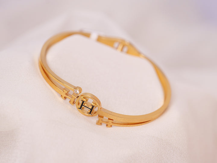 Signature Emblem Gold Cuff Bracelet