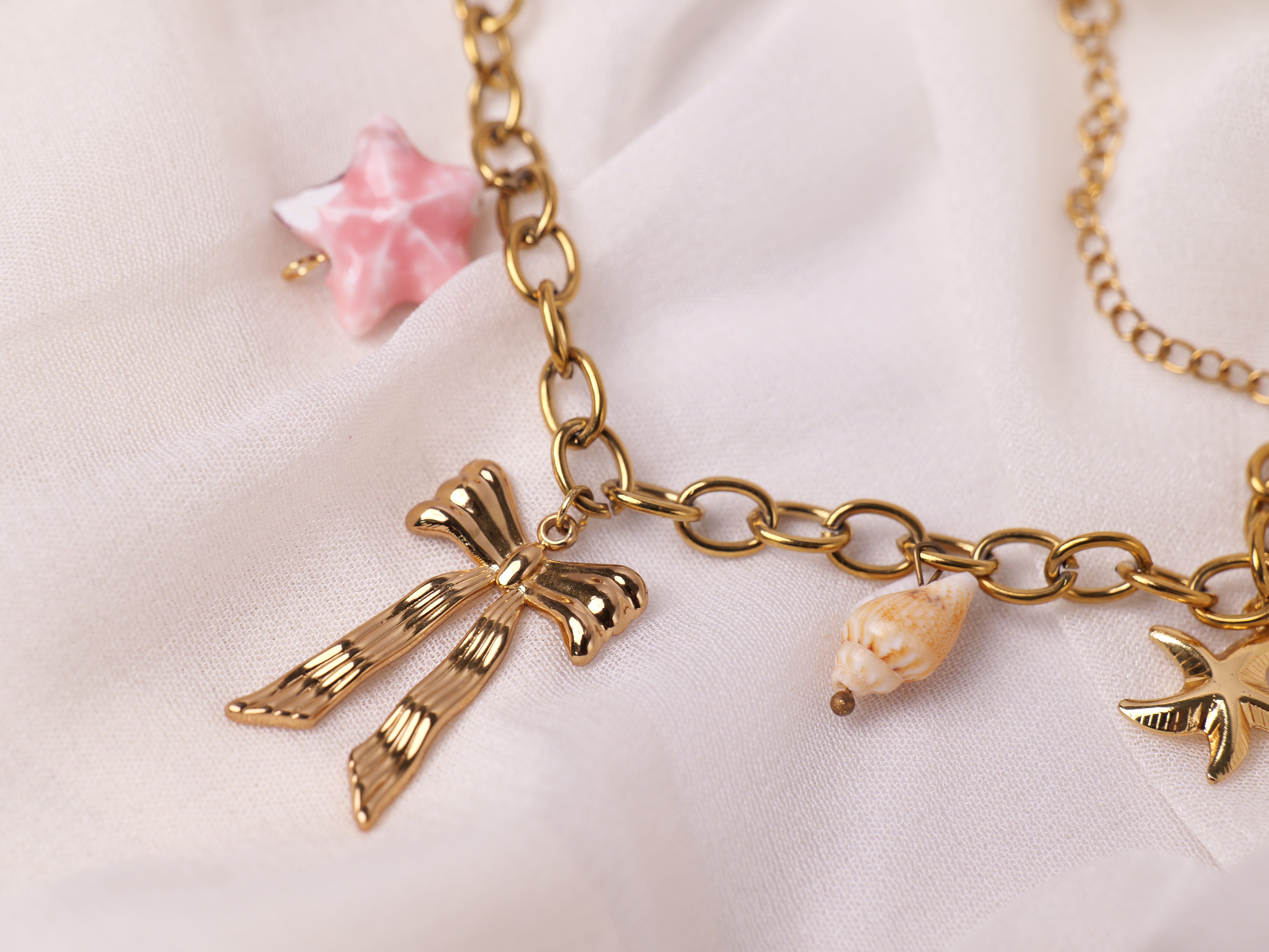 Golden Bow & Star Charm Bracelet