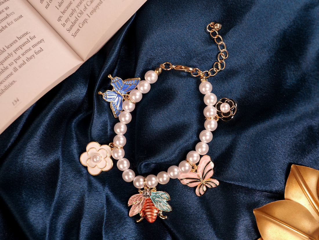 Elegant Pearl Beaded Charm Bracelet with Butterfly & Floral Accents