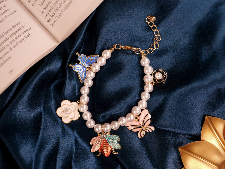Elegant Pearl Beaded Charm Bracelet with Butterfly & Floral Accents